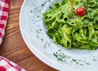 plate-filled-with-pasta-with-pistachio-butter-topping